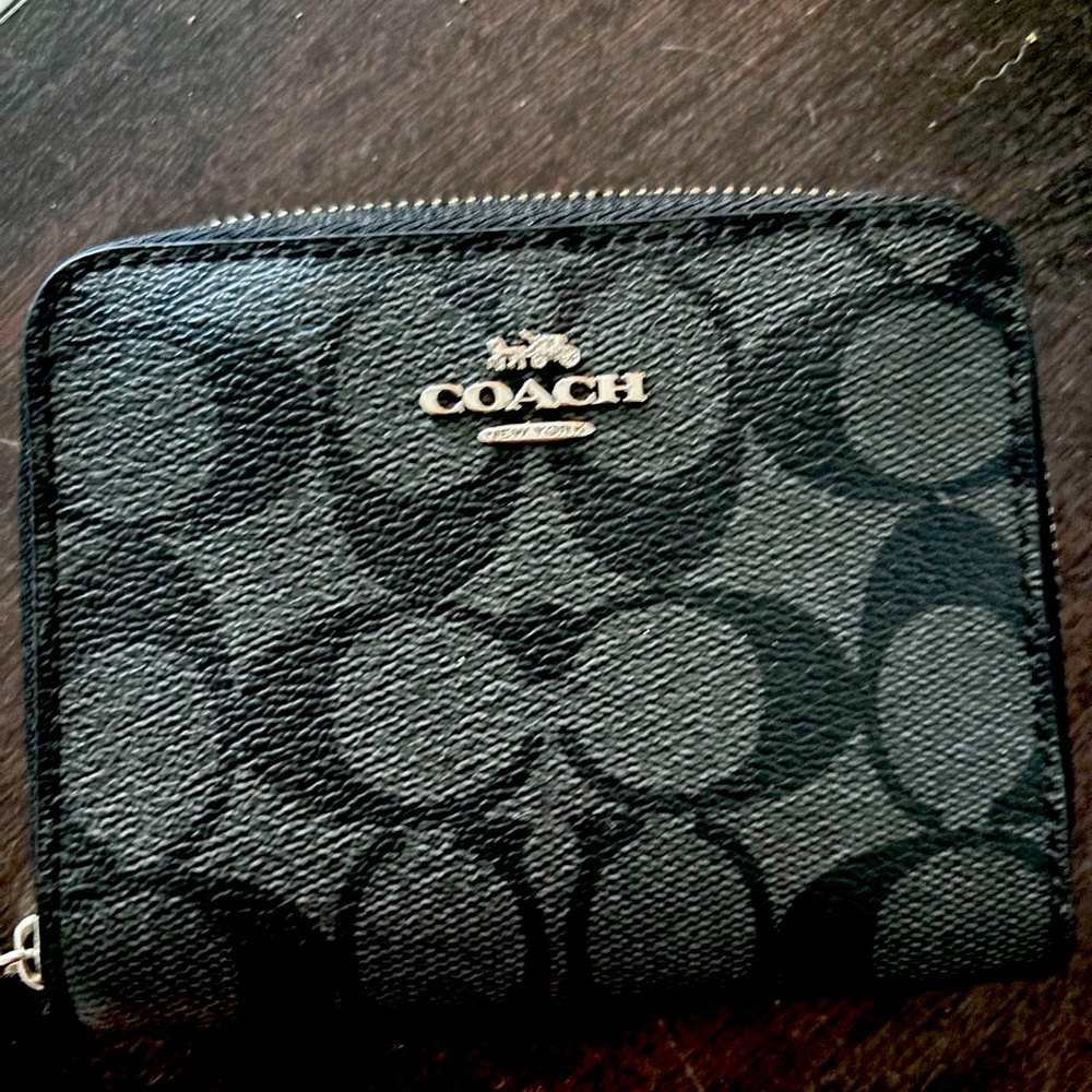 Coach zip around wallet. Barley used. Like new condition. $35